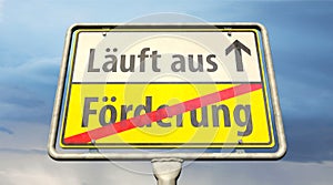 Place-name sign with the German words `FÃ¶rderung` Funding and `LÃ¤uft aus` Runs out
