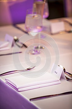 Place setting with name tage for a wedding ceremony party photo
