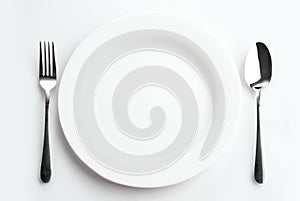 Place setting with plate, spoon and fork