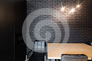 A place to eat in the kitchen. black brick wall