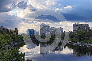 Place to stay. Quiet and cozy area on the left side of the Dnieper River in Kiev. Multi-storey buildings at background