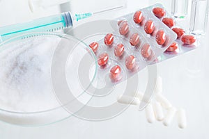 Placebo pills and injection photo