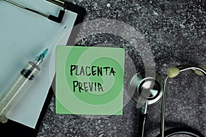 Placenta Previa write on sticky notes on the table. Medical or Healthcare concept photo