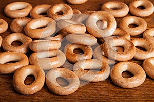 Placer bagels on wooden with shallow depth of field photo