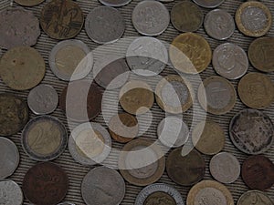 Placer of coins of different countries money photo