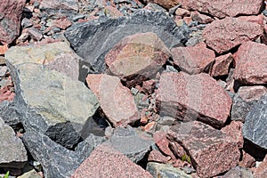 Placer of gray and red stones different sizes