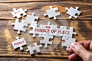 Placing missing a piece of puzzle photo