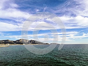 Plages du Prado under a cloudy sky and sunlight in Marseille in France