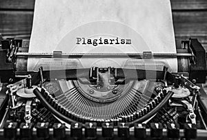 Plagiarism, copyright written. Close it. printed on a sheet of paper. photo