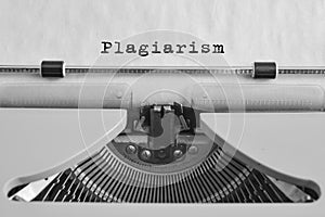 Plagiarism typed on an old typewriter. vintage thing. Copyright.