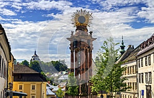 Plague column in the Trinity Square and new castle, Banska Stiavnica, Slovakia