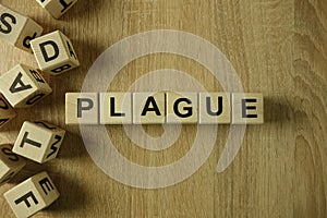Plague word from wooden blocks