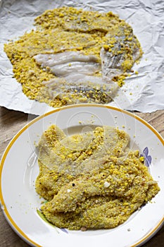 Plaice fillets just breaded