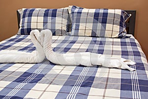 Plaid Bed with Pillow and Towel Decoration