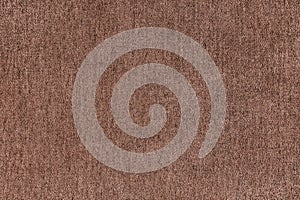 Plain brown velours fleecy upholstery fabric texture background.