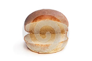 Plain burger bun isolated on white