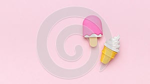 Plain and fruity ice cream on a pink background