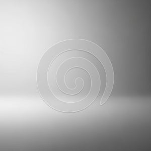 A plain gray gradient background with no discernible features or objects. The top of t