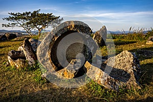 Plain of Jars, a megalithic archaeological landscape in Laos. Xieng Khouang at golden hour.