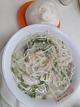 Plain Noodle Soup with Pork Siopao