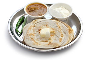 Plain paratha with curry and yogurt