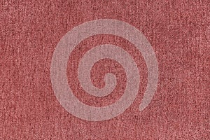 Plain red velours fleecy upholstery fabric texture background.