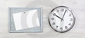 Plain wall clock with notice board on grey banner