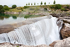 Plain waterfall of the Cijevna river. It is called Montenegrin Niagara Falls. Surroundings of Podgorica city. Montenegro, Europe