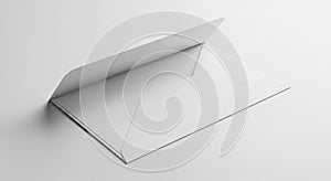 A plain white envelope is partially open, resting on a smooth white surface. The envelo