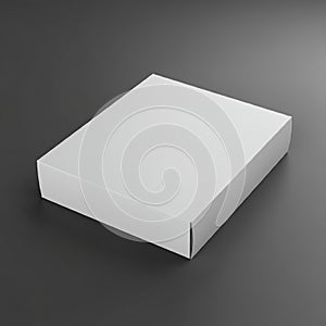 A plain, white, rectangular cardboard box sits on a dark gray surface. The box has