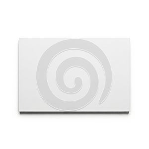 A plain white rectangular object with a smooth surface and rounded edges