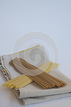 Plain and wholemeal spaghetti put togheter