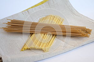 Plain and wholemeal spaghetti put togheter