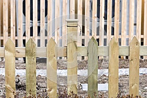 Plain wooden fence of backyards
