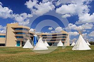 Plains First Nations Tipis in front of First Nations University Building, University of Regina, Saskatchewan, Canada photo