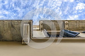 Plaka, Athens / Greece. Looking up into the sky below a house in Plaka