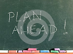 Plan Ahead! written on a chalkboard