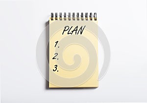 Plan inscription on empty paper of notebook with 1, 2, 3 steps or points