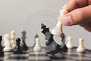 Plan leading strategy of successful business competition leader concept, Hand of player chess board game putting white pawn, Copy