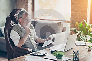 Plan profit paper cost debt credit bill success tax people armchair chair freelance company owner concept. Side profile view