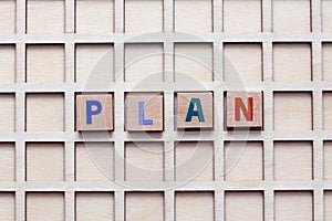 Plan the word arranged with wooden letters