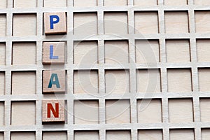 Plan the word arranged with wooden letters