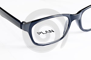 Plan word see through glasses lens, business concept