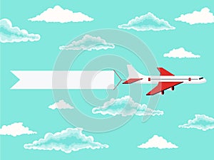 Plane and advertising banner in the cloudy sky