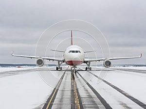 Plane on the airport\'s frozen snow runway. Generated with AI