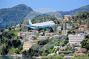 Plane approaching Corfu airport. Kanoni peninsula, Corfu island, Ionian Sea, Greece.