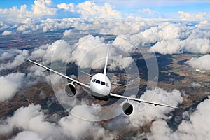 Plane clouds on the plane nature background blue