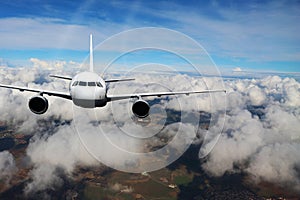 Plane clouds on the plane nature background blue