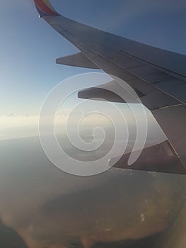 Plane clouds wing atmosphere sky