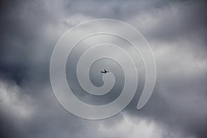 Plane on cloudy day photo
